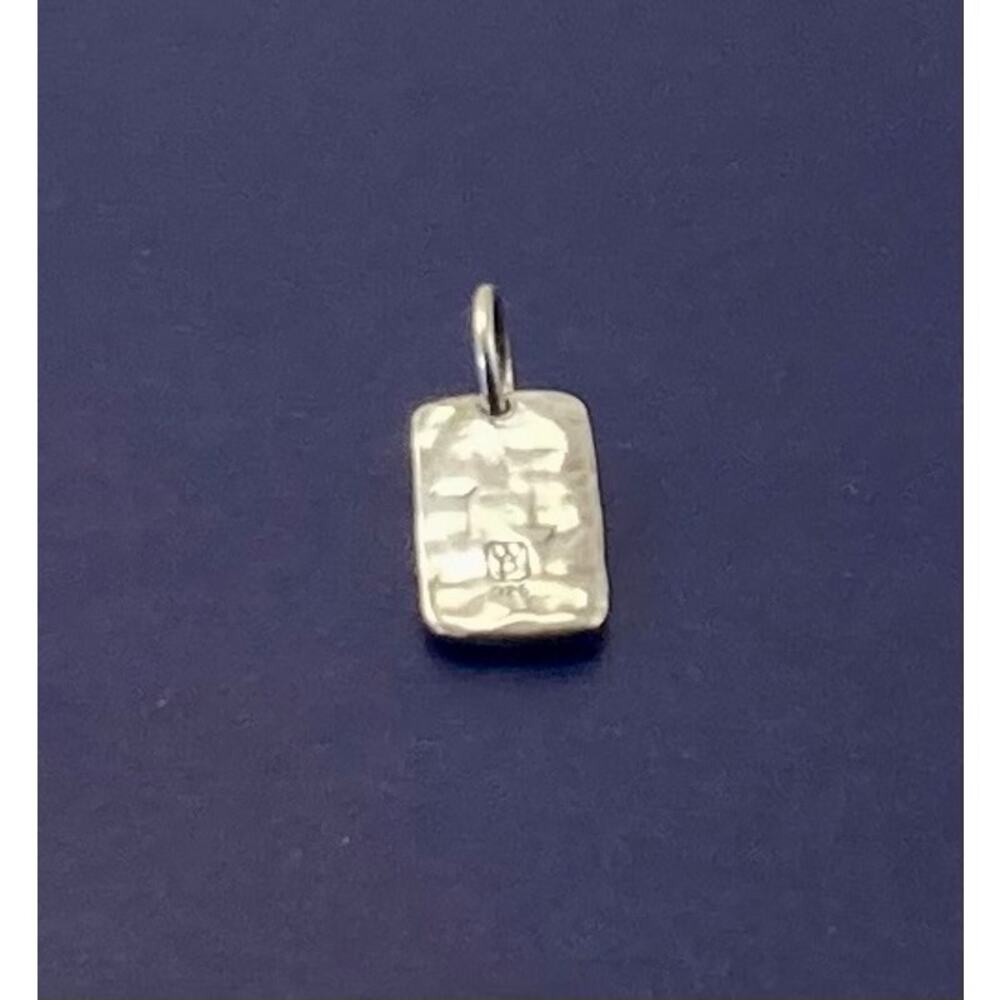 Waxing Poetic sterling silver Tag Insignia charm